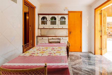 Casa à venda com 4 quartos, 228m² em Jardim Santo Amaro, São Paulo