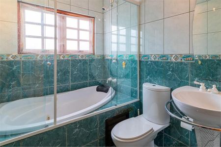 Casa à venda com 228m², 4 quartos e 4 vagas