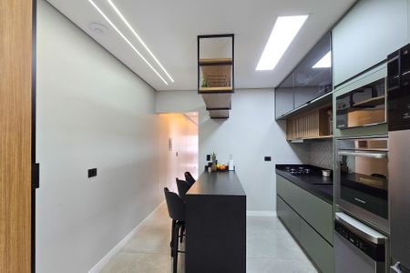 Casa à venda com 131m², 3 quartos e 3 vagas Casa à venda com 131m², 3 quartos e 3 vagasCozinha