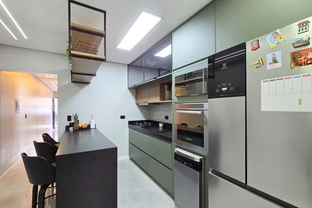 Casa à venda com 131m², 3 quartos e 3 vagas Casa à venda com 131m², 3 quartos e 3 vagasCozinha