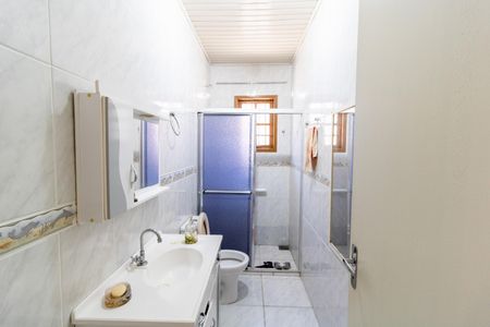 Casa à venda com 110m², 4 quartos e 2 vagas Casa à venda com 110m², 4 quartos e 2 vagasBanheiro 1