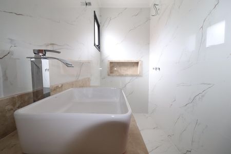 Casa à venda com 199m², 4 quartos e 3 vagasBanheiro Quarto 1 suíte