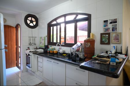 Casa à venda com 125m², 2 quartos e 2 vagas Casa à venda com 125m², 2 quartos e 2 vagasCozinha