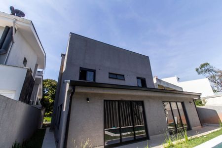 Casa de condomínio à venda com 400m², 4 quartos e 6 vagas Casa de condomínio à venda com 400m², 4 quartos e 6 vagasFachada