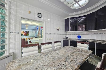 Casa de condomínio para alugar com 480m², 4 quartos e 6 vagasCopa