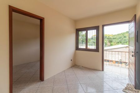 Sala de casa de condomínio para alugar com 1 quarto, 37m² em Vila Nova, Porto Alegre