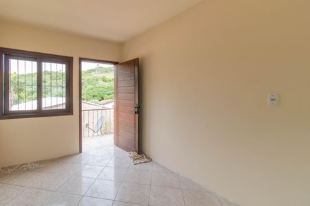 Sala de casa de condomínio para alugar com 1 quarto, 37m² em Vila Nova, Porto Alegre