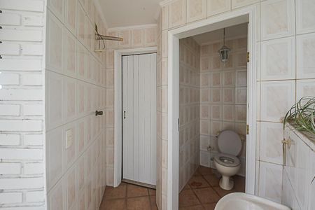 Casa de condomínio à venda com 510m², 4 quartos e 5 vagasBanheiro de serviço 3