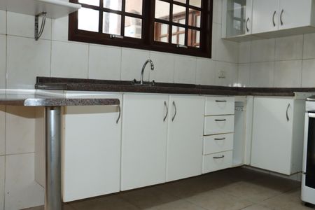 Casa de condomínio para alugar com 280m², 3 quartos e 3 vagasCozinha