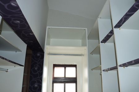 Casa de condomínio para alugar com 280m², 3 quartos e 3 vagasCloset Suíte 3