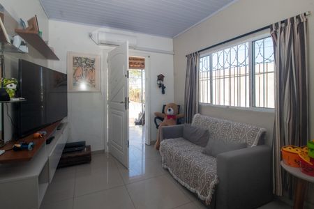 Sala de casa à venda com 4 quartos, 134m² em Vila Nova, Porto Alegre