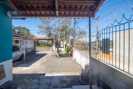 Vista de casa à venda com 4 quartos, 134m² em Vila Nova, Porto Alegre