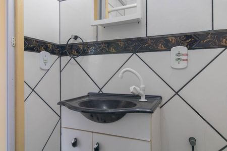 Banheiro de apartamento à venda com 1 quarto, 25m² em Menino Deus, Porto Alegre