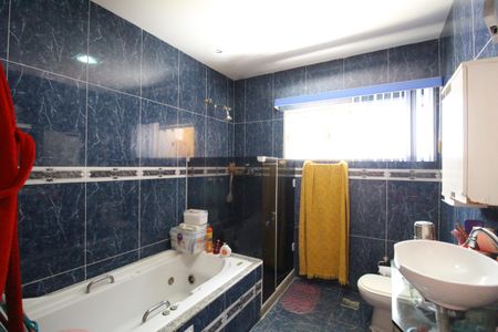 Casa de condomínio para alugar com 242m², 4 quartos e 1 vagaBanheiro da suíte 1