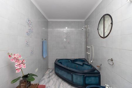 Casa à venda com 440m², 3 quartos e 7 vagasBanheiro da Suíte