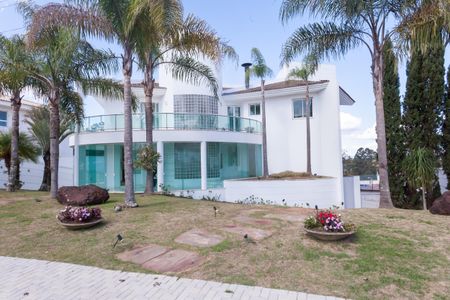 Casa de condomínio para alugar com 470m², 4 quartos e 5 vagasFachada