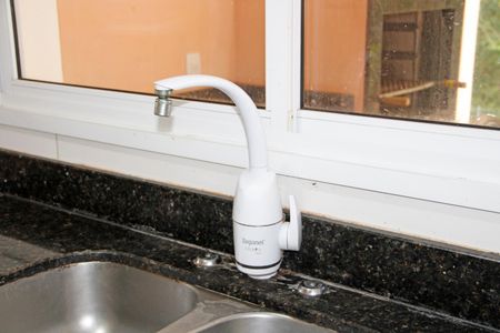 Casa de condomínio para alugar com 200m², 4 quartos e 4 vagasCozinha