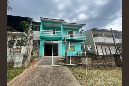 Casa à venda com 106m², 2 quartos e 2 vagas Casa à venda com 106m², 2 quartos e 2 vagasFachada