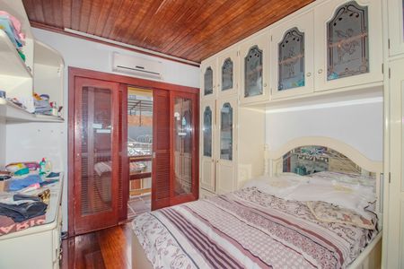 Quarto 2 de casa para alugar com 3 quartos, 300m² em Vila Ipiranga, Porto Alegre