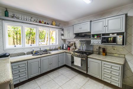 Casa de condomínio para alugar com 450m², 4 quartos e 3 vagasCozinha