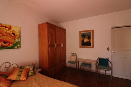 Casa à venda com 180m², 3 quartos e 4 vagasQuarto 1 - Suíte