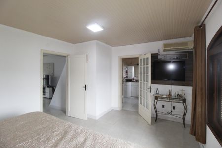 Suíte 1 de casa à venda com 3 quartos, 210m² em Parque Santa Fé, Porto Alegre