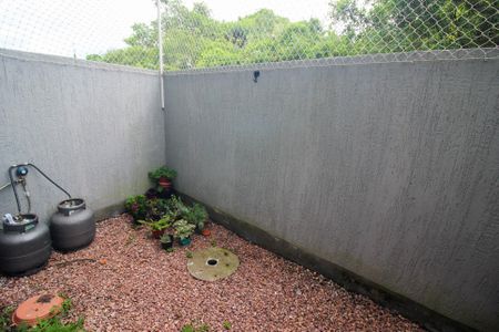 Casa de condomínio à venda com 55m², 2 quartos e 1 vagaQuintal