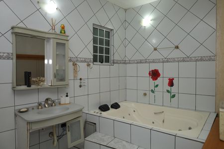 Casa à venda com 170m², 4 quartos e 4 vagasBanheiro 1 - Suíte