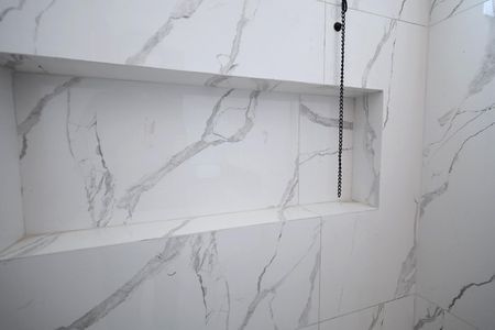 Casa à venda com 70m², 2 quartos e 2 vagasBanheiro Suíte 1