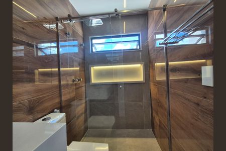 Casa de condomínio à venda com 400m², 4 quartos e 2 vagasBanheiro suite 3