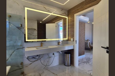 Casa de condomínio à venda com 400m², 4 quartos e 2 vagasBanheiro suite 1