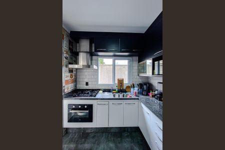 Casa à venda com 103m², 2 quartos e 2 vagas Casa à venda com 103m², 2 quartos e 2 vagasCozinha