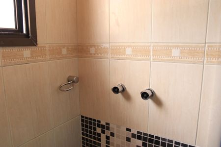 Casa de condomínio para alugar com 247m², 4 quartos e 2 vagasBanheiro da Suíte 3