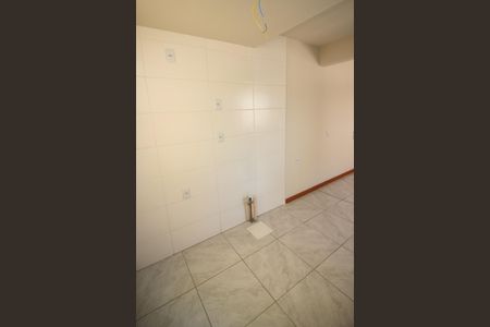 Apartamento à venda com 44m², 2 quartos e 1 vaga Apartamento à venda com 44m², 2 quartos e 1 vagaCozinha e Área de Serviço