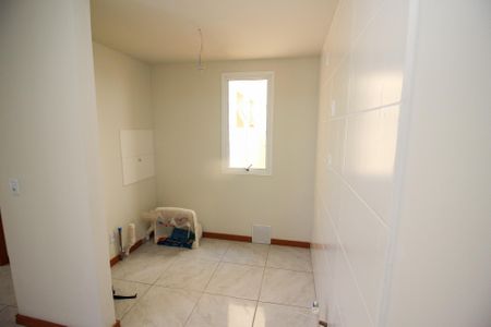 Apartamento à venda com 44m², 2 quartos e 1 vaga Apartamento à venda com 44m², 2 quartos e 1 vagaCozinha e Área de Serviço