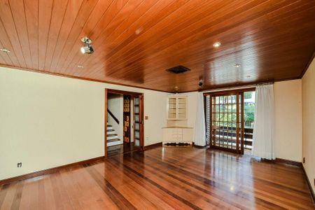 Sala de casa de condomínio à venda com 3 quartos, 330m² em Bela Vista, Porto Alegre