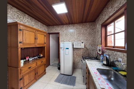 Casa de condomínio à venda com 100m², 2 quartos e 3 vagasCozinha e Área de Serviço