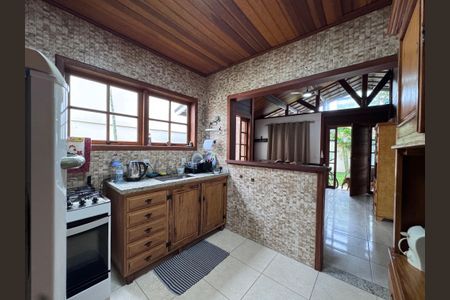 Casa de condomínio à venda com 100m², 2 quartos e 3 vagasCozinha e Área de Serviço