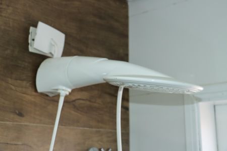 Casa de condomínio para alugar com 355m², 3 quartos e 5 vagasBanheiro da Suíte 2