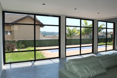 Casa de condomínio para alugar com 450m², 4 quartos e 6 vagasSala