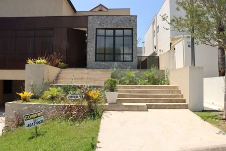 Casa de condomínio para alugar com 450m², 4 quartos e 6 vagasFachada