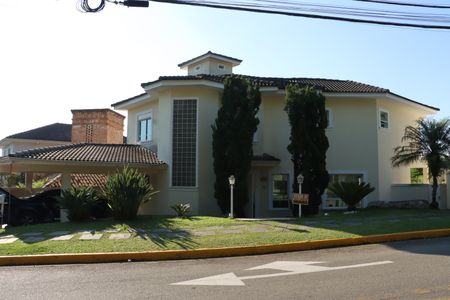 Casa de condomínio para alugar com 380m², 4 quartos e 4 vagasFachada