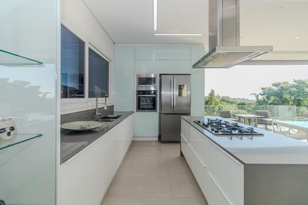 Casa de condomínio à venda com 309m², 3 quartos e 4 vagasCozinha e Área de Serviço