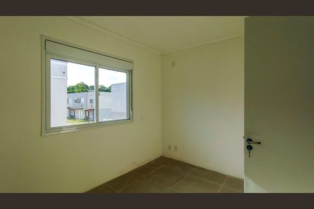 Quarto 2 de casa de condomínio para alugar com 2 quartos, 80m² em Campo Novo, Porto Alegre