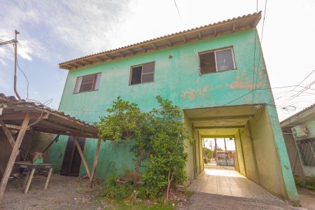 Casa à venda com 220m², 4 quartos e 4 vagasFachada Posterior