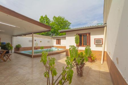 Casa à venda com 60m², 3 quartos e 2 vagasÁrea externa/Fundos