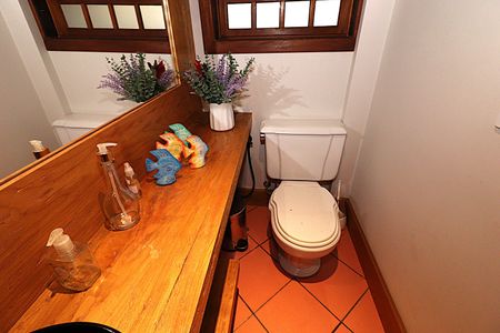 Casa à venda com 400m², 4 quartos e 2 vagasBanheiro 4