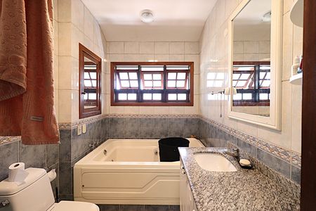 Casa à venda com 400m², 4 quartos e 2 vagasSuíte 1 Banheiro