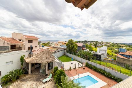 Vista de casa à venda com 3 quartos, 229m² em Espírito Santo, Porto Alegre