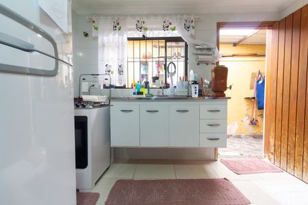 Casa à venda com 69m², 2 quartos e 2 vagas Casa à venda com 69m², 2 quartos e 2 vagasCozinha